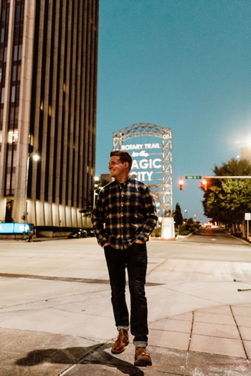 CJ Jones on a city street at dusk
